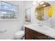 Well-lit bathroom with a modern sink, round mirror, and classic fixtures at 1727 Hartford Dr, Gastonia, NC 28052