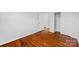 Bedroom featuring hardwood floors, base trim, and a closet at 1727 Hartford Dr, Gastonia, NC 28052