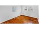 Bedroom with hardwood floors, base trim, and a bright window at 1727 Hartford Dr, Gastonia, NC 28052