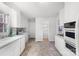 Full view of kitchen with laundry and bathroom access at 1727 Hartford Dr, Gastonia, NC 28052