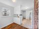 Kitchen boasts hardwood floors and white cabinetry at 1727 Hartford Dr, Gastonia, NC 28052