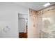 The bathroom shower features nice tile and glass door with chrome features at 1727 Hartford Dr, Gastonia, NC 28052