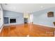 Spacious basement recreation area with fireplace at 423 Whitestone Rd, Charlotte, NC 28270