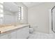 Bathroom with granite countertop, white cabinets, and shower at 423 Whitestone Rd, Charlotte, NC 28270