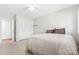 Bright bedroom with double closet and neutral decor at 423 Whitestone Rd, Charlotte, NC 28270