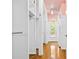 Hallway with built-in closets and pink walls at 423 Whitestone Rd, Charlotte, NC 28270