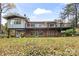 Mid-century modern home with a large deck and expansive backyard at 423 Whitestone Rd, Charlotte, NC 28270