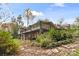 House exterior showcasing a two-story home with a deck and lush landscaping at 423 Whitestone Rd, Charlotte, NC 28270