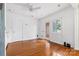 Laundry room with hardwood floors and built-in shelving at 423 Whitestone Rd, Charlotte, NC 28270