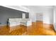 Living room with hardwood floors and sectional sofa at 423 Whitestone Rd, Charlotte, NC 28270