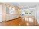 Spacious living room with hardwood floors and built-in entertainment center at 423 Whitestone Rd, Charlotte, NC 28270