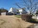 Beautiful two-story home with a well-maintained lawn and a classic architectural design at 8540 Indian Summer Trl, Harrisburg, NC 28075