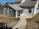 View of Sun Room exterior with lots of natural light at 8540 Indian Summer Trl, Harrisburg, NC 28075