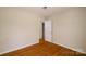 Comfortable bedroom with hardwood floors and a closet at 1018 Carysbrook Ln, Charlotte, NC 28217