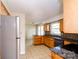 Functional kitchen with oak cabinets, granite countertops and stainless steel appliances at 1018 Carysbrook Ln, Charlotte, NC 28217