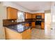 Well-equipped kitchen with stainless steel appliances, tile backsplash, and ample counter space at 1018 Carysbrook Ln, Charlotte, NC 28217