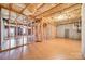 Spacious unfinished basement with wooden framing and visible insulation, offering potential for customization at 10730 Rogalla Dr, Charlotte, NC 28277