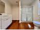 Clean bathroom, featuring a shower and white vanity at 124 Lee Mccurry Rd, Lincolnton, NC 28092