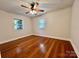 Bright bedroom with hardwood floors and ceiling fan at 124 Lee Mccurry Rd, Lincolnton, NC 28092