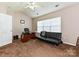 This carpeted bedroom has great natural light, a ceiling fan, and has flexible space at 14121 Winford Ln, Charlotte, NC 28262