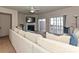 Inviting living room featuring a fireplace, neutral-toned sofa and sliding glass doors to a deck at 14121 Winford Ln, Charlotte, NC 28262