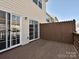 Enjoy outdoor living on this private wooden deck with sliding glass door access at 14121 Winford Ln, Charlotte, NC 28262