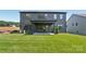 Expansive backyard featuring a well-maintained lawn and a cozy patio perfect for outdoor gatherings at 15009 Brownleigh Ln # 26, Huntersville, NC 28078