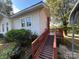 House exterior with ramp access to deck at 203 E Cannon Ave, Albemarle, NC 28001