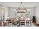 Bright dining room with hardwood floors and a farmhouse-style table at 2876 Oakhurst Dr, Rock Hill, SC 29732