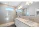 Contemporary bathroom featuring a double vanity and a large walk-in shower at 916-A Westbrook Dr, Charlotte, NC 28202