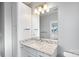 Modern bathroom with a single vanity and a large mirror at 916-A Westbrook Dr, Charlotte, NC 28202