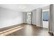 Bright bedroom with hardwood floors and large windows at 916-A Westbrook Dr, Charlotte, NC 28202
