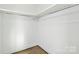 Well-lit closet with a single hanging rod and a shelf at 916-A Westbrook Dr, Charlotte, NC 28202