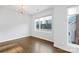 Bright dining room with hardwood floors and large windows at 916-A Westbrook Dr, Charlotte, NC 28202