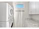 Laundry room with washer, dryer, and granite countertop at 916-A Westbrook Dr, Charlotte, NC 28202