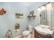 Charming half-bath with a unique vanity, decorative mirror, and stylish fixtures at 15450 Millview Trace Ln, Mint Hill, NC 28227