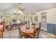 Bright dining area featuring large windows and a view of the backyard at 15450 Millview Trace Ln, Mint Hill, NC 28227