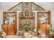 Close-up of the stone fireplace with decorative mantle and built-in shelving at 15450 Millview Trace Ln, Mint Hill, NC 28227