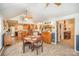 Open kitchen and dining area with modern appliances and tile flooring at 15450 Millview Trace Ln, Mint Hill, NC 28227