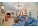 Spacious living room with stone fireplace, vaulted ceilings, and comfortable seating, ideal for relaxing and entertaining guests at 15450 Millview Trace Ln, Mint Hill, NC 28227