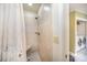 Tiled shower with built-in seat, showcasing functional design at 15450 Millview Trace Ln, Mint Hill, NC 28227