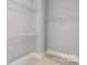 Walk-in closet with wire shelving and carpet flooring to provide ample storage space at 4440 Moxie Way, Charlotte, NC 28215