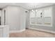 Dining room with neutral colors and lots of natural light at 4440 Moxie Way, Charlotte, NC 28215