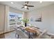 Dining room with a window and contemporary decor and lighting at 8021 Joy Crossing Ln, Charlotte, NC 28214