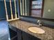 Bathroom vanity with granite countertop and modern sink at 18140 Nantz Rd, Cornelius, NC 28031