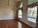 Elegant dining room featuring hardwood floors and a large chandelier at 18140 Nantz Rd, Cornelius, NC 28031