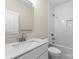 Modern bathroom features a sleek vanity, tiled shower with a niche, and chrome fixtures at 1914 Irma St, Charlotte, NC 28216