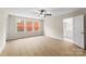 Bedroom featuring luxury vinyl flooring, a ceiling fan, and natural light at 1914 Irma St, Charlotte, NC 28216