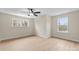 Spacious bedroom featuring new floors, a ceiling fan, and natural light at 1916 Irma St, Charlotte, NC 28216