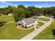 Aerial view of a house, detached garage, and large workshop on a spacious lot at 5070 Woodleaf Rd, Salisbury, NC 28147